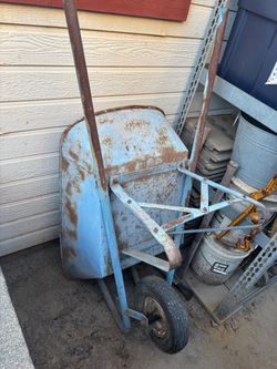 Metal wheelbarrow.