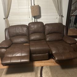 Full-Size Couch, Two Reclining Seats And The Rug