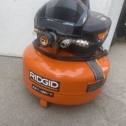 RIDGID 6 Gal. 150 PSI Portable Electric Oil-Free Jobsite Pancake Air Compressor with Dual Pressure Gauges and 2-Quick Couplers