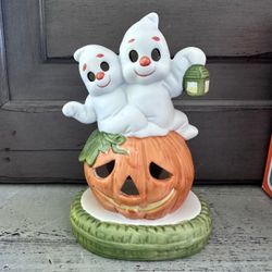 Vintage Halloween ghosts ceramic votive candle holder w/ box.  6” tall x 3 3/4” across the bottom