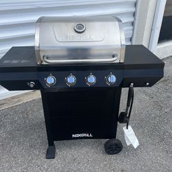 Delivery Available! Nexgrill 4 Burner Propane Gas BBQ Grill! Works great! Includes cover. Does not include propane tank
