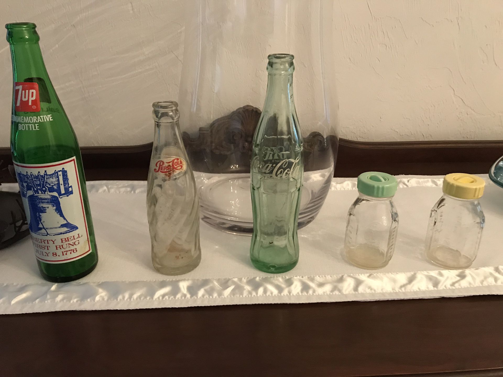 Antique bottles (7UP, Pepsi, Coke, baby bottles)