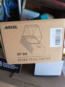 Spark plug tester