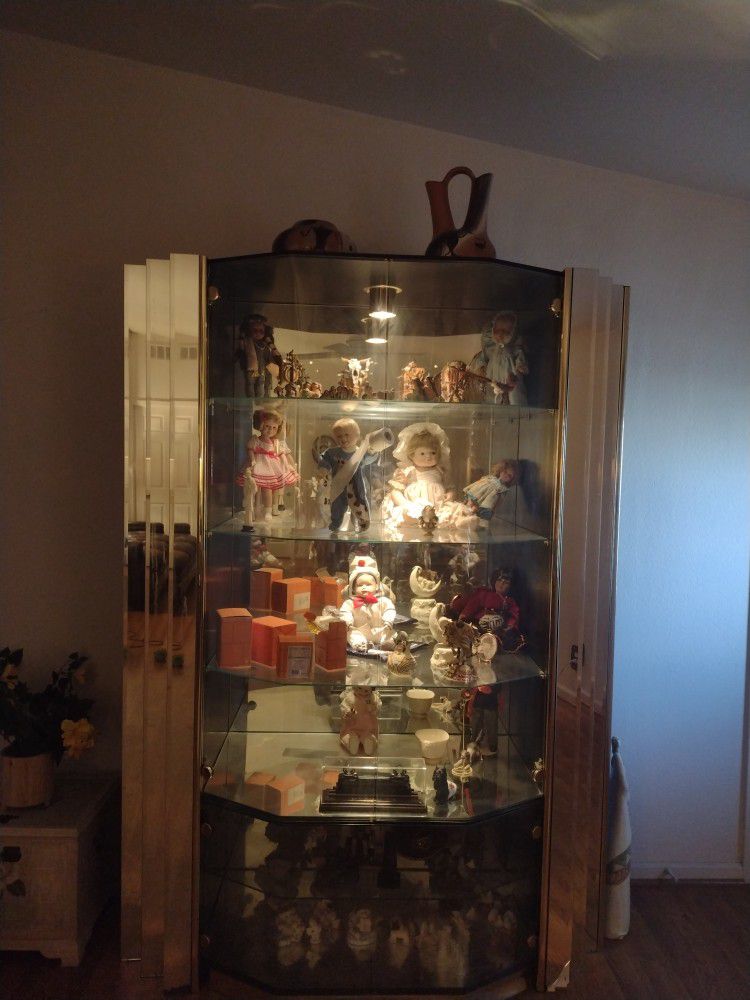 Beautiful Glass Display Case/ Hutch Filled With A Collection Of Porcelain Dolls And Glass Knickknacks 