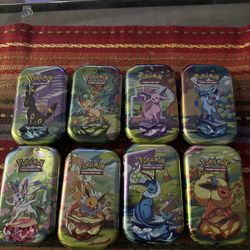 Pokemon Prismatic Evolutions Tins