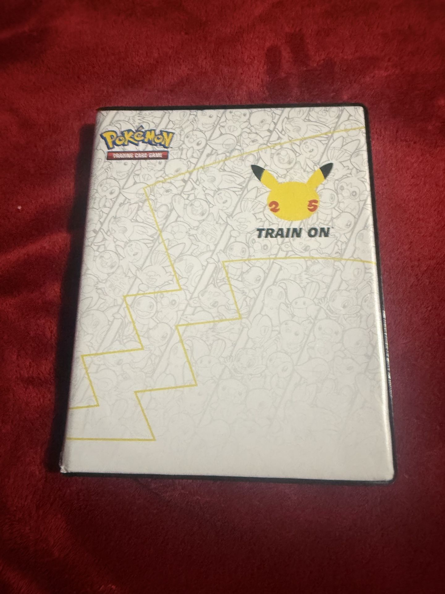 Pokémon binder with 9 cards inside