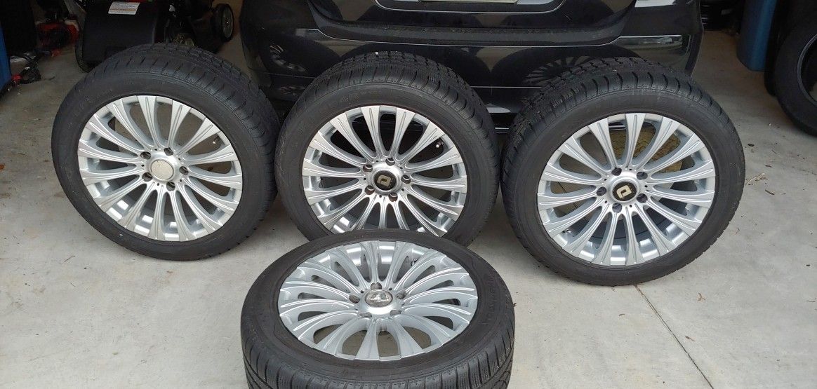 BMW RIMS AND TIRES.