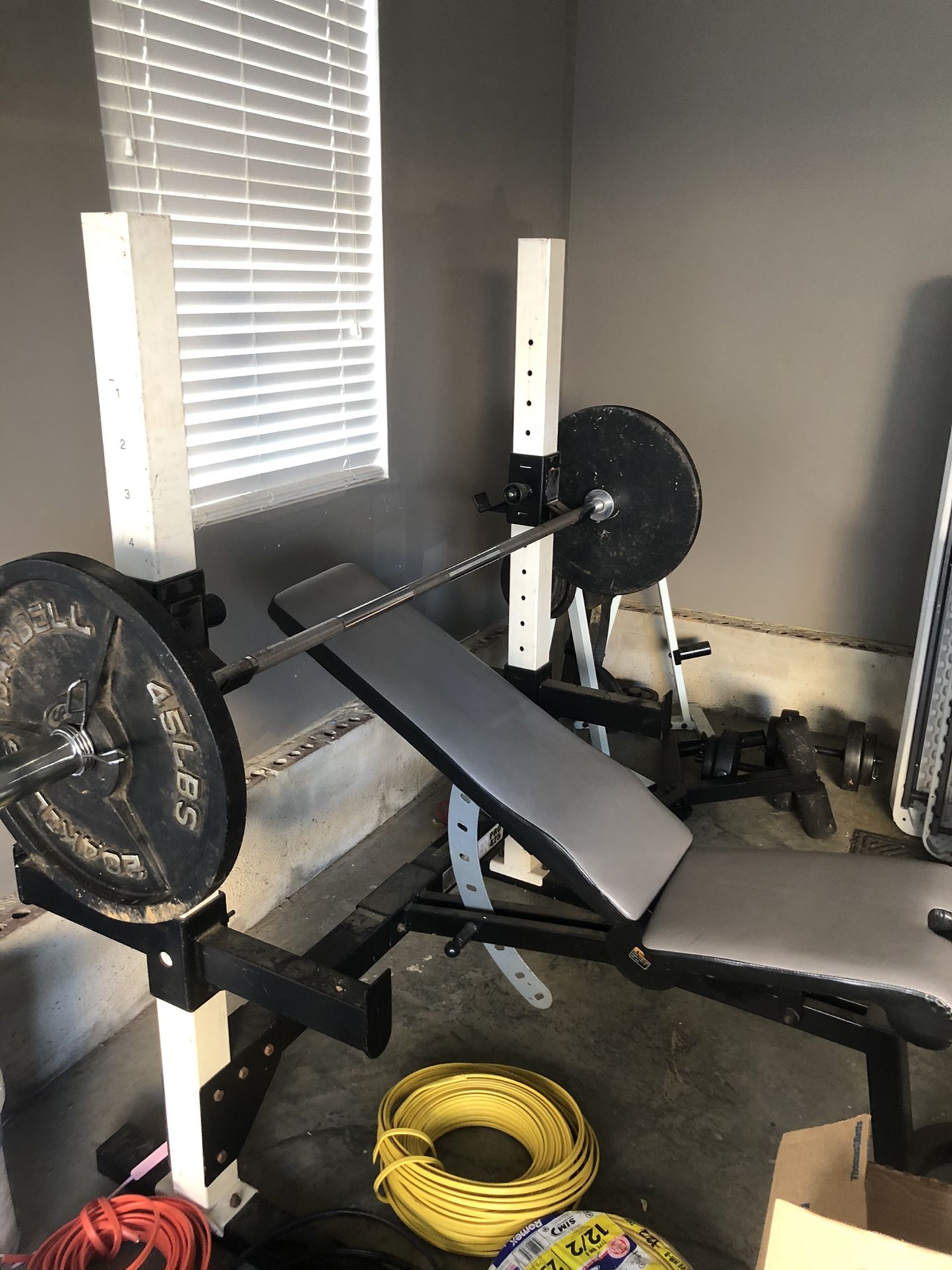 Weider Pro weight bench , 350 lbs of weights and racks