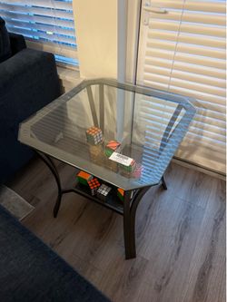 Two glass end tables