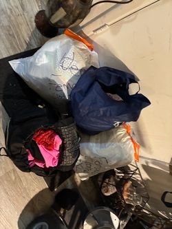 A lot of women’s clothes and purses