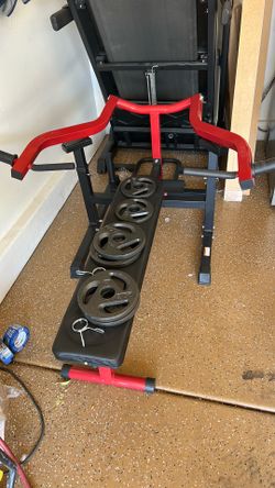 Bench press machine + four 10lbs metal plates and two 5lbs metal plates