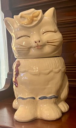 Ceramic cookie jar titled 'Puss 'n Boots' by Shawnee Pottery (10"x7")