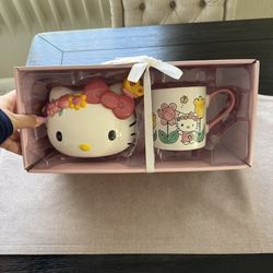 Hello kitty piggy bank and mug set