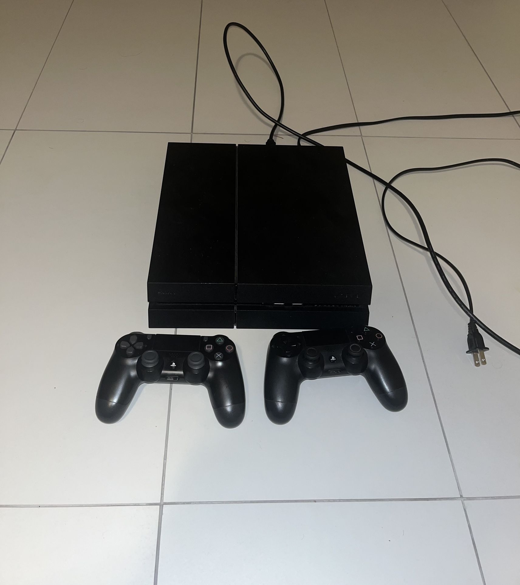 PlayStation 4 Console Bundle - 500GB + 2 Controllers