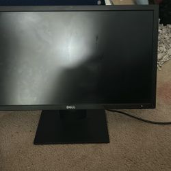 A Dell Computer With The cord