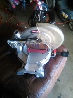 Miter saw with laxer crathsman