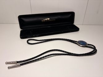 CASH/TRADE Bolo Tie with Blue Crystal Oval Slide