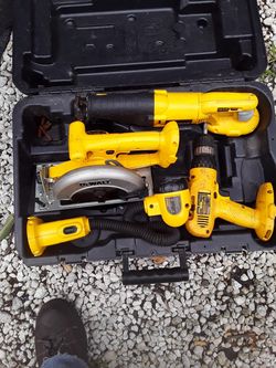 Dewalt set 4 piece saw-saw,drill,skill-saw,flashlight,,,,, needs charger but i have a battery.