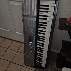 Casio Electric Keyboard With Stand