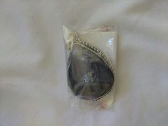 Natural pear shaped Bi-Color Amethyst Pendant. Weight is 18.81 Thibet silver. Brand new. Just imported from India.