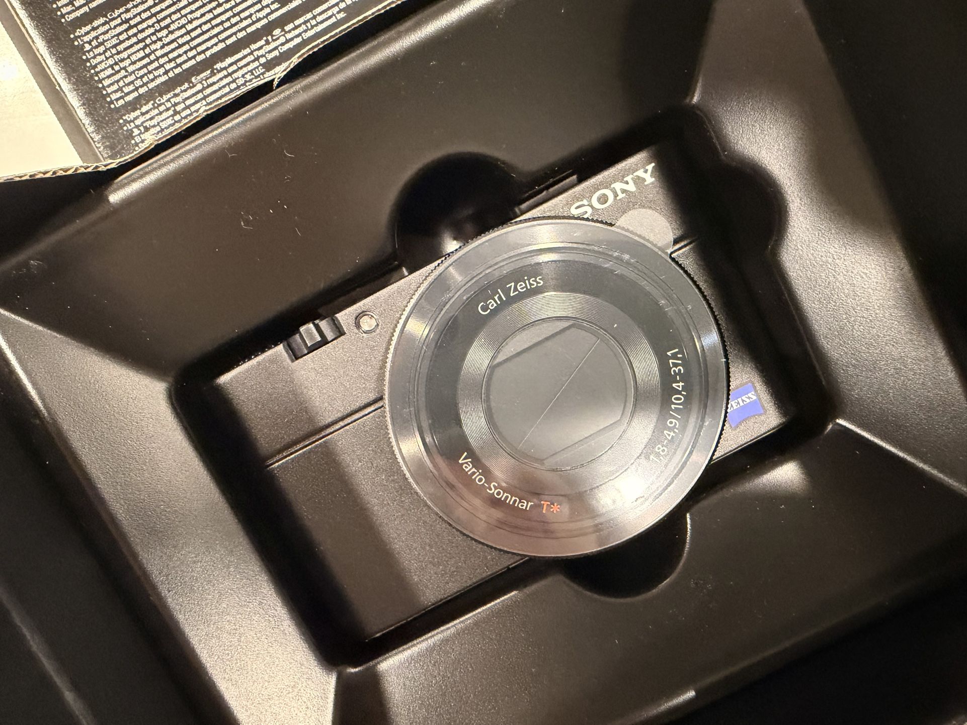 BRAND NEW Sony Cybershot DSC-RX100 Carl Zeiss Digital Camera for $1000