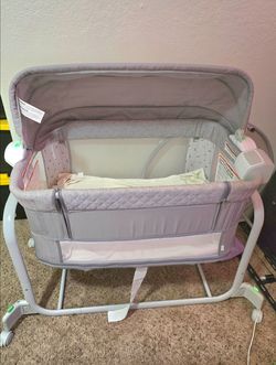 Bed side bassinet