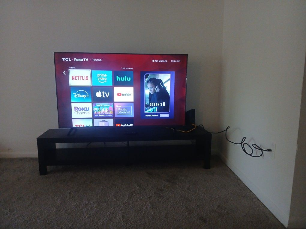 55" Roku TCL TV with TV stand - Like New