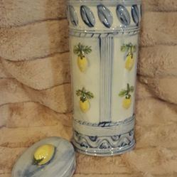 Tall oval ceramic container