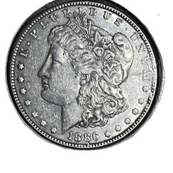 1886-O Morgan Silver Dollar 7 Tail Variety Mint State