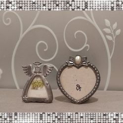 TWO TINY PEWTER PICTURE FRAMES 
