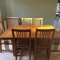 Dining room table with two Expanding Inserts 6 Chairs