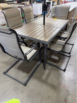 Outdoor patio dining set with umbrella