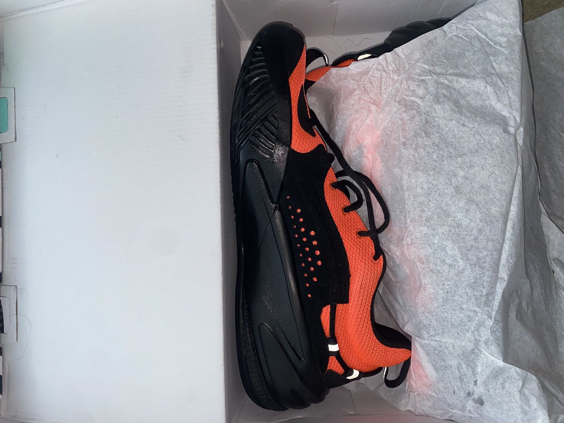 Selling j cole dreamers basketball shoes , they are red black and white and a Size 10
