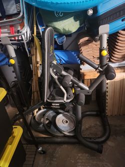 Gold's Gym Weight Bench with 6 Weider weights and long barbell