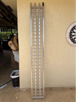 Motorcycle ramp curved , good cond approx 7’ 4” by 12”.