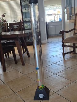 sensory LED water bubble tube floor lamp featuring a color-changing light base and artificial fish
