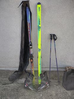 SKI'S. AND POLES ROSIGNAL