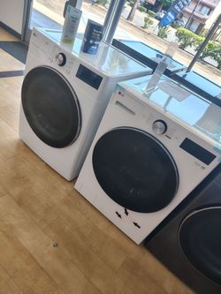 $1618 LG gas washer dryer set with turbo wash and steam