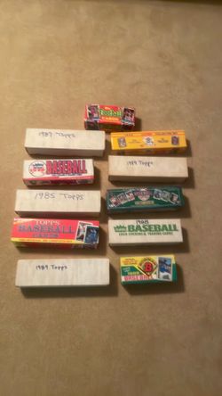 11 complete sets of new sports cards