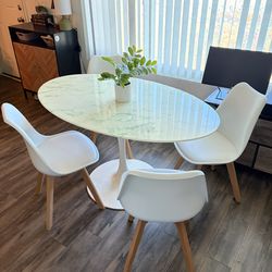 Marble Oval Table “54 w/ 4 White Cushion Chairs