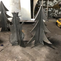 Steel Snowmen And XMas Treess