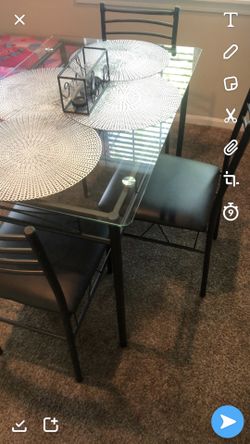 Glass dining table with chairs