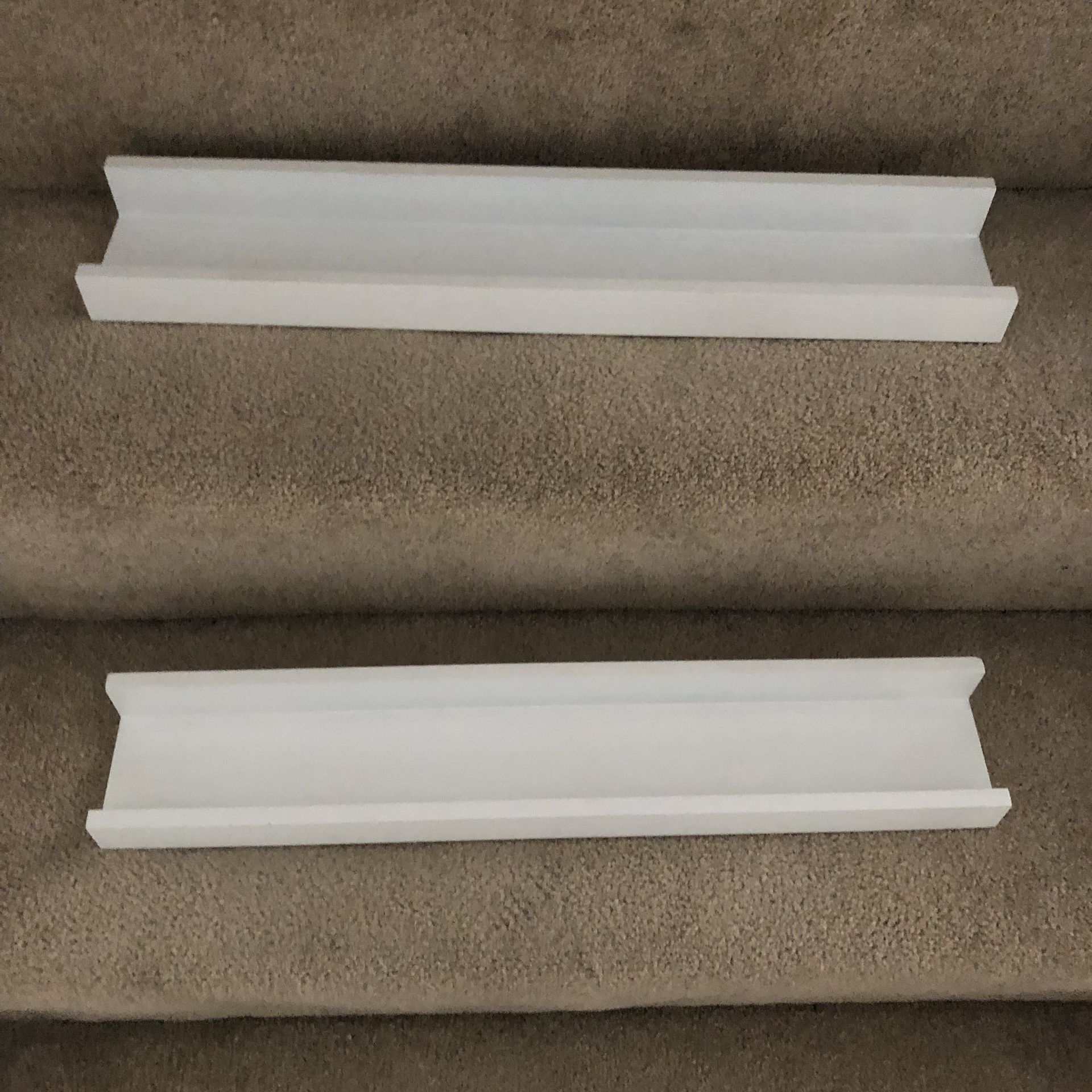 Set of two white book shelves