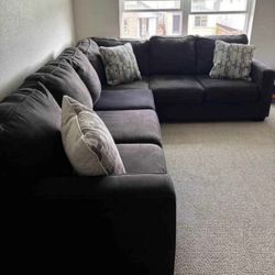 Lucina 3pc 120" by 95" Sectional Sofa from Ashley HomeStores