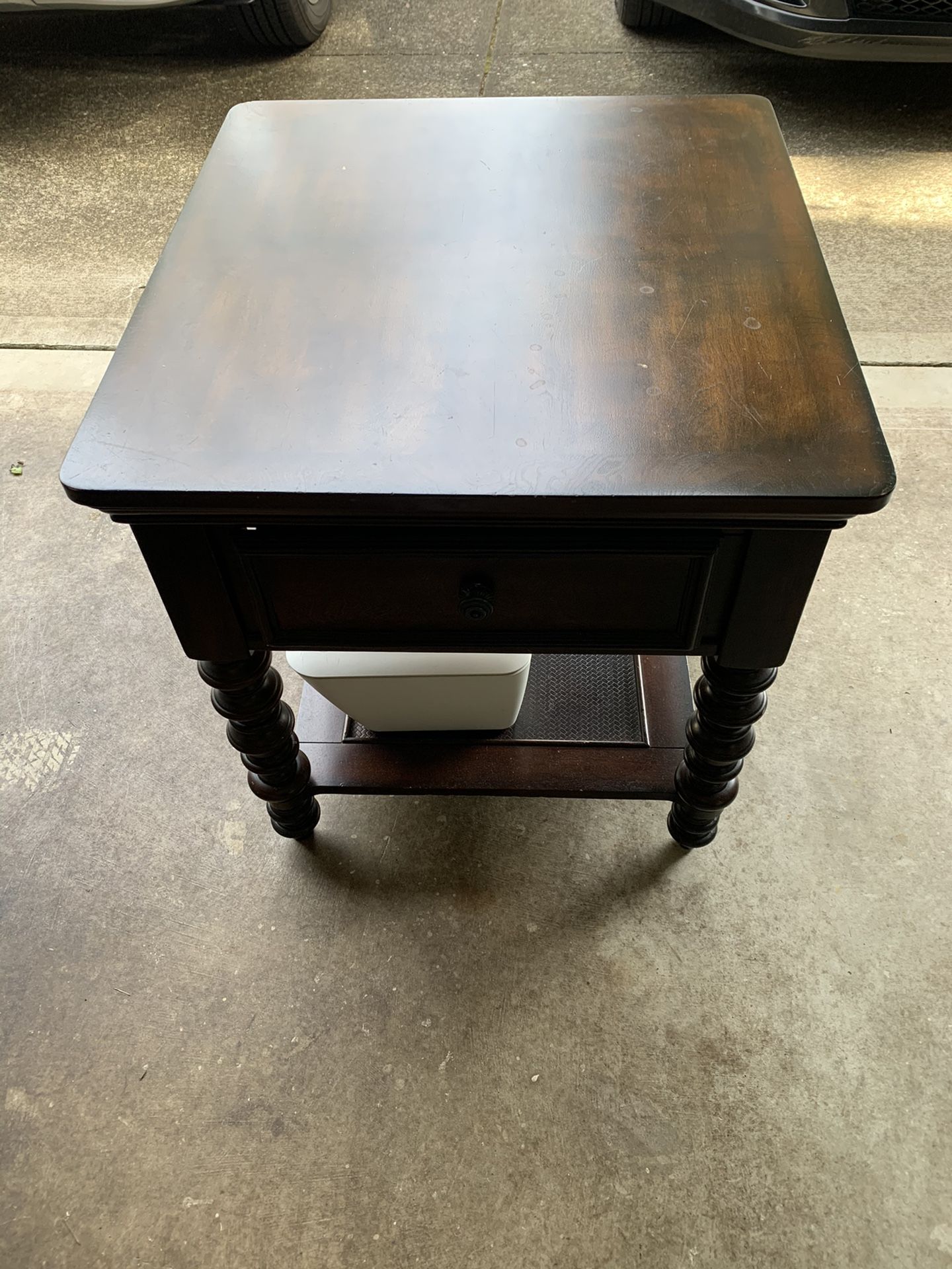 Dark brown wood end table