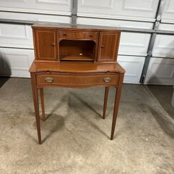 BEAUTIFUL VINTAGE SECRETARY DESK IN GOOD CONDITION. IT MEASURES 42 W,16 D AND  30H. $100.00  OR BEST OFFER. 