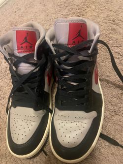 Jordan 1 Retro High OG "Bred" sneakers in black, white, and red