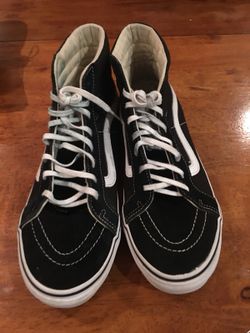 Pair of black-and-white vans sk8-hi