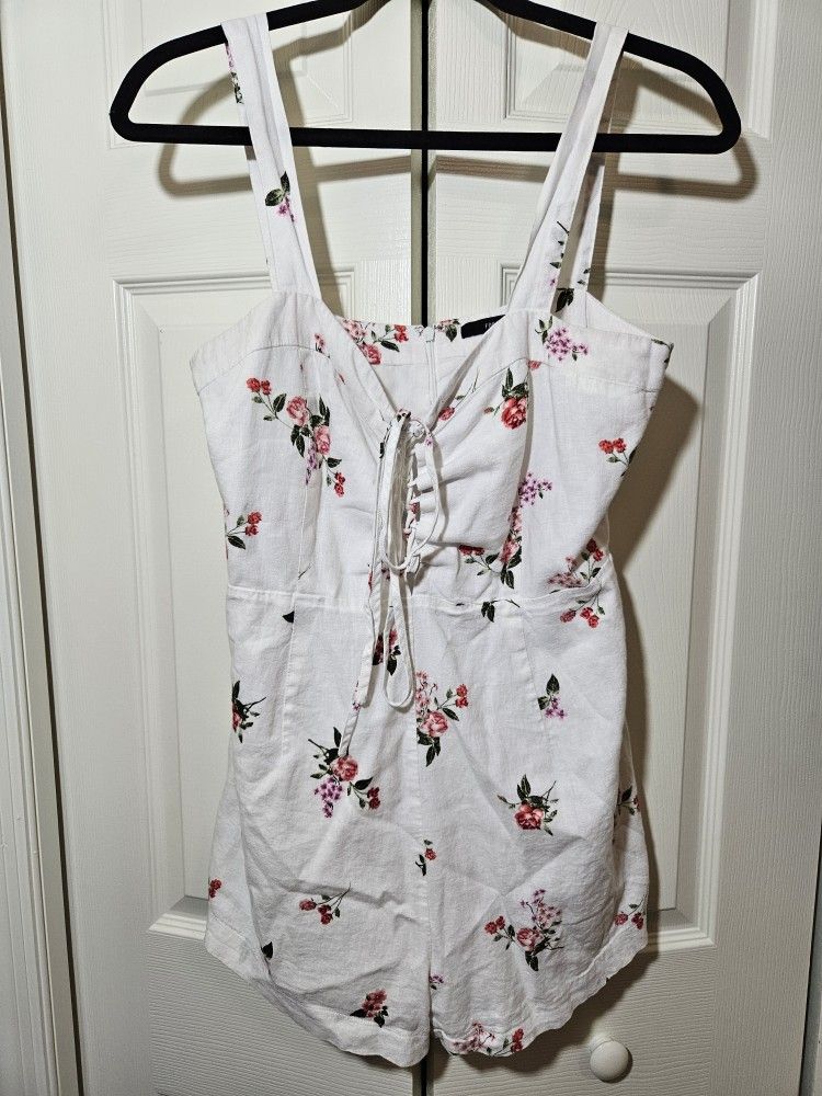 Forever twenty one size large, white romper, with flowers