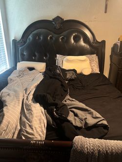Three piece dark wood bedroom set